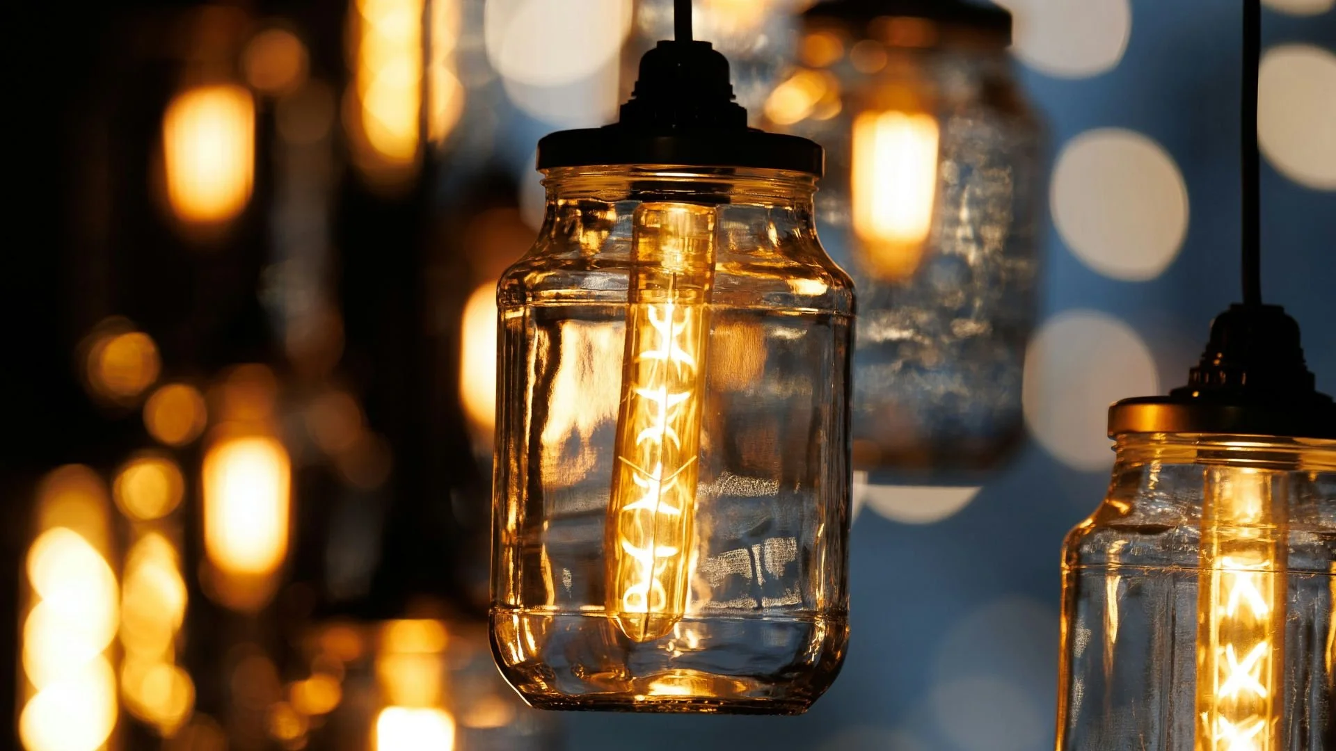 Warm vintage Edison lights suspended in glass jars representing the Causeways Palette Terms of Use.