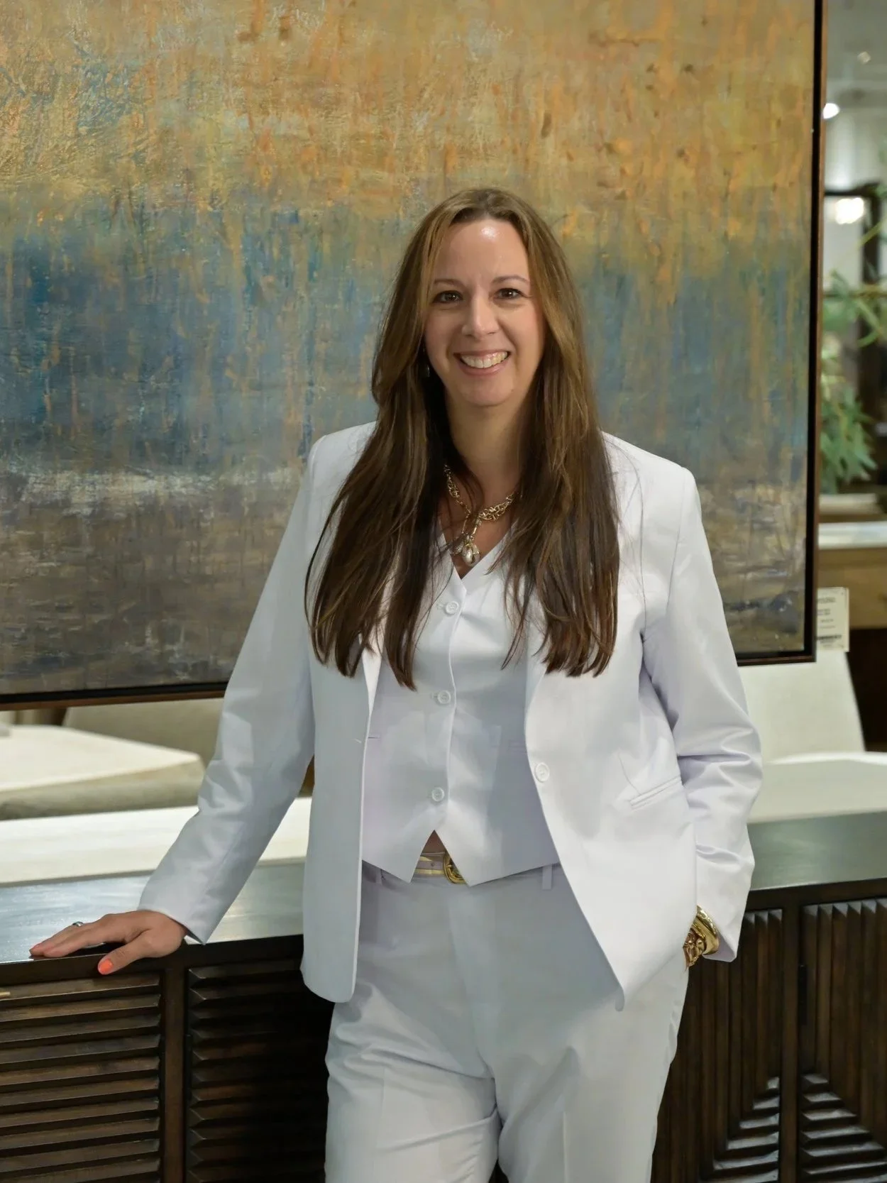 Stacie Sinai, founder and principal designer of Studio Sinai, specializing in vacation rental design, guest experience, and property safety