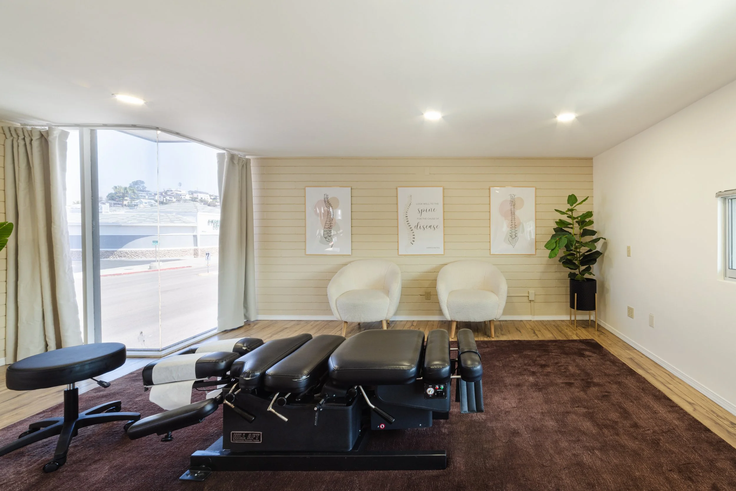 The light-filled treatment space at Revive Chiropractic in Point Loma