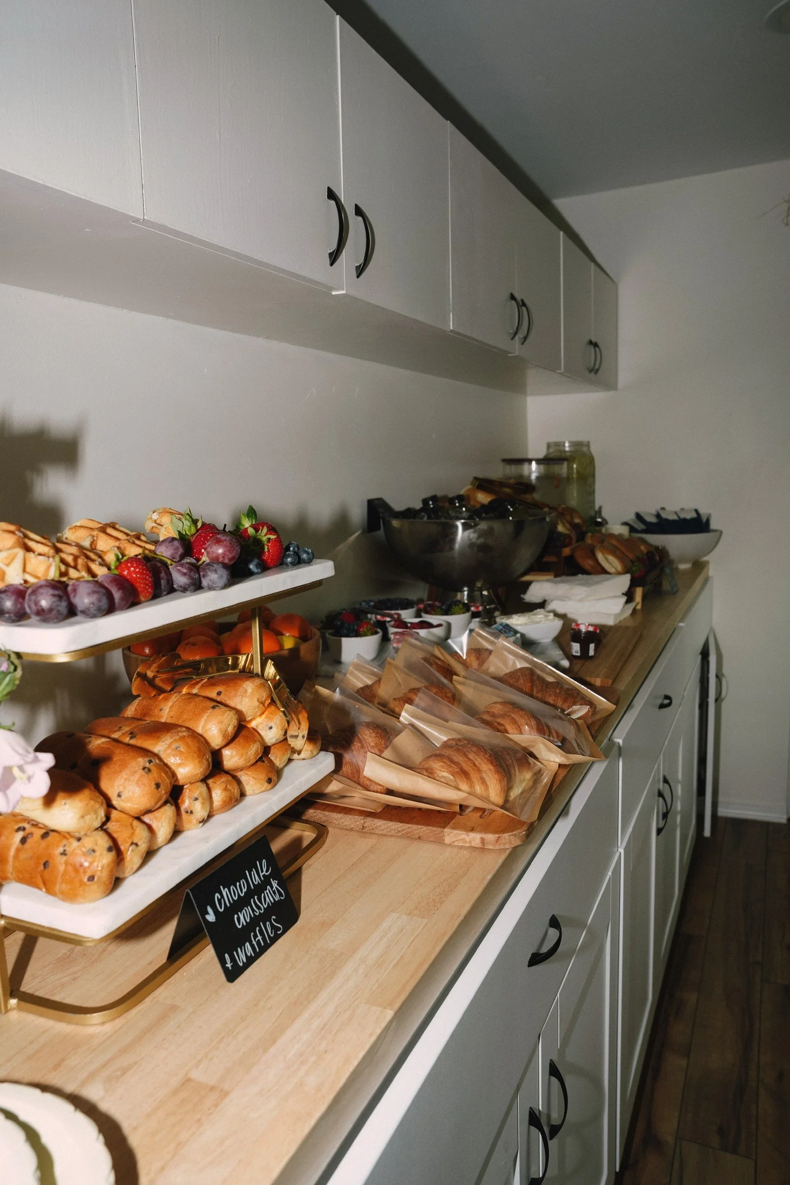 Catering spread of pastries and fresh fruit at a private event at Revive, Point Loma