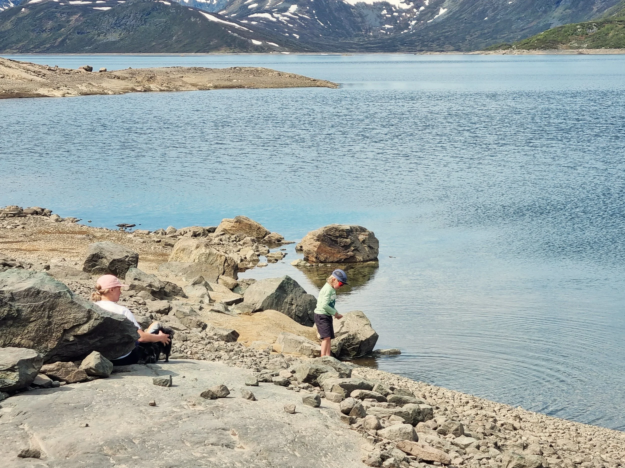 Rock skipping at the lake in Jotunheimen