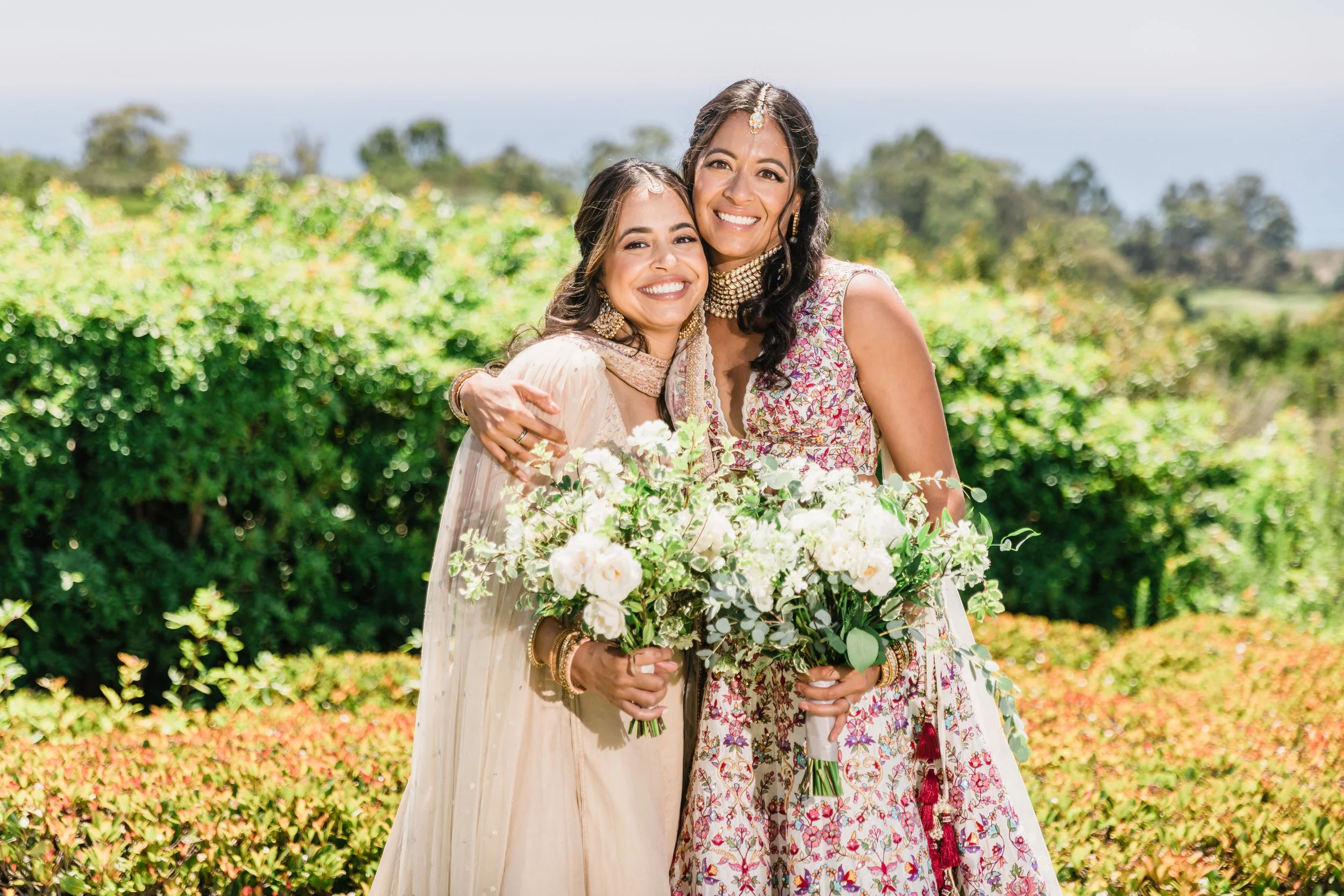 Bride and sister before her Eastern wedding ceremony
