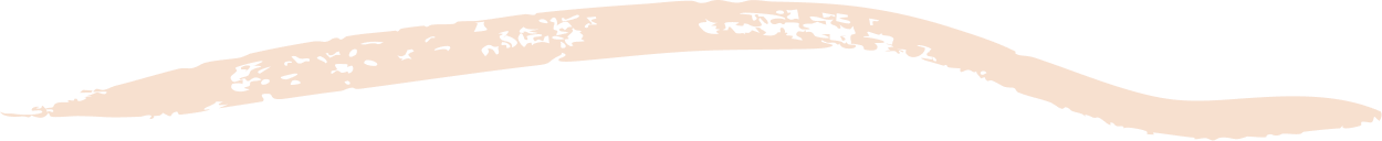 A paintbrush with beige paint on the bristles, isolated on a white background.