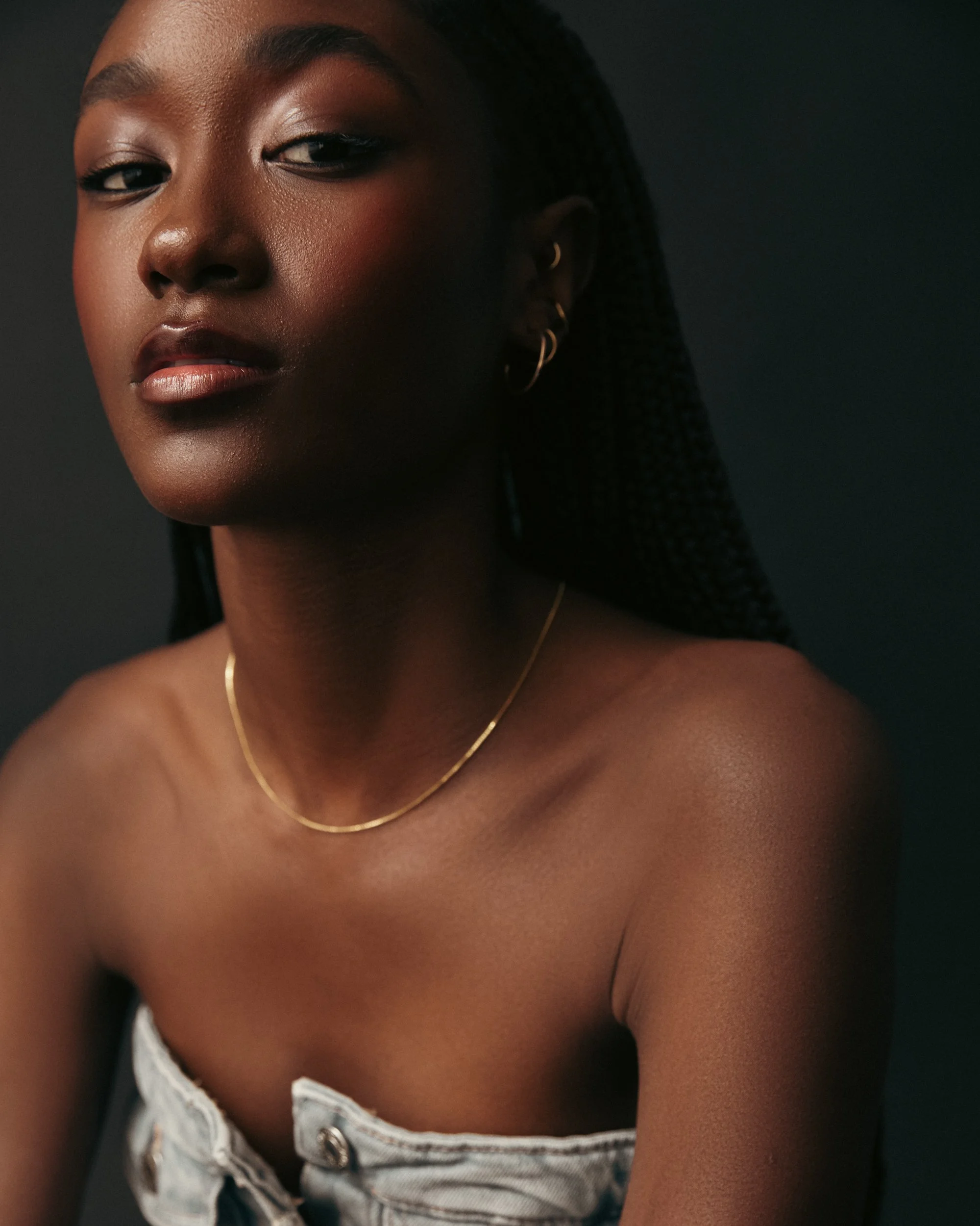 Editorial beauty portrait showcasing radiant skin and refined makeup artistry by Seattle editorial makeup artist Jordan Hafford.