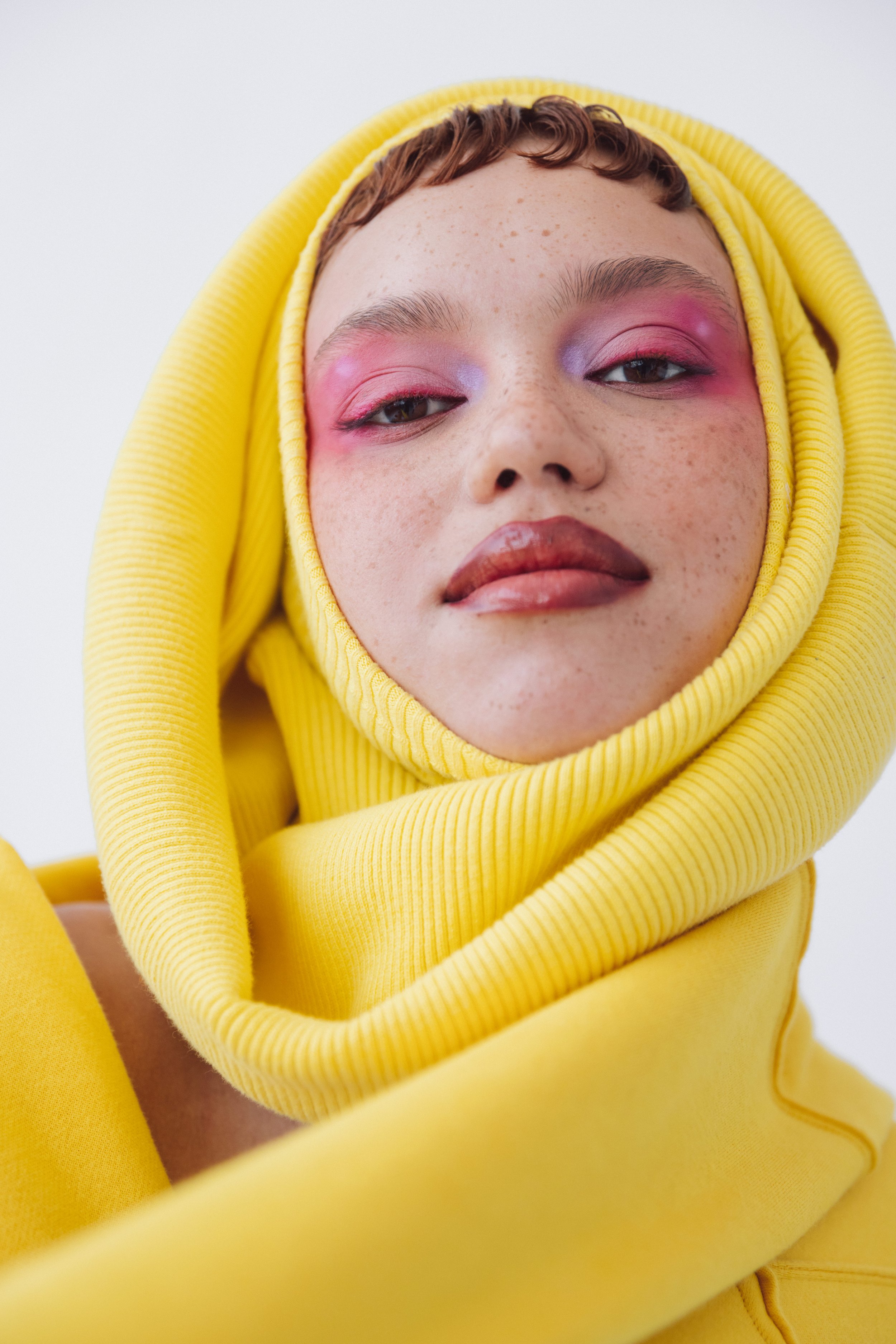 Bold editorial makeup featuring vibrant color and artistic beauty styling by Seattle editorial makeup artist Jordan Hafford.
