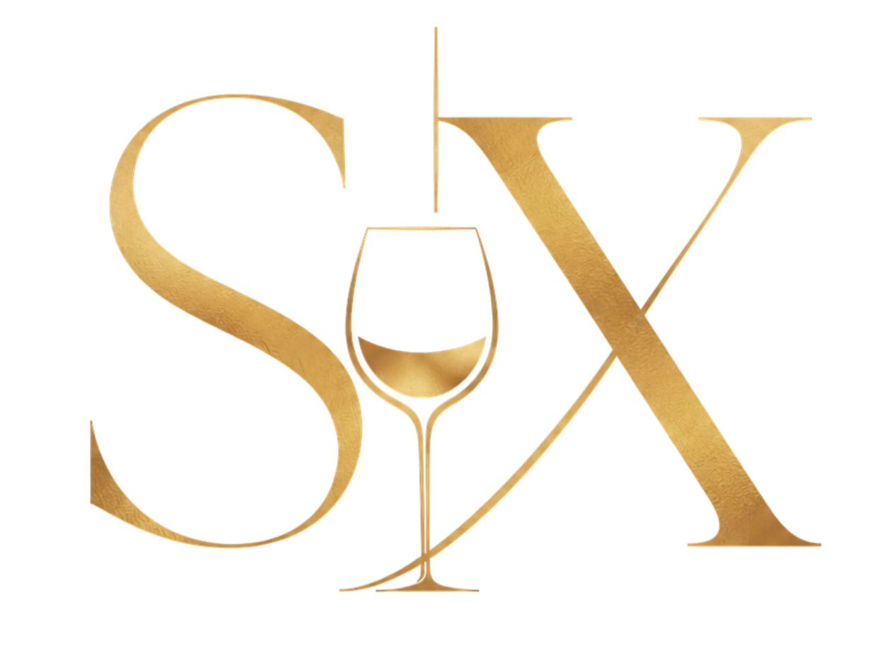 The word 'SEX' in large, gold, stylized letters with colorful geometric shapes in the background.