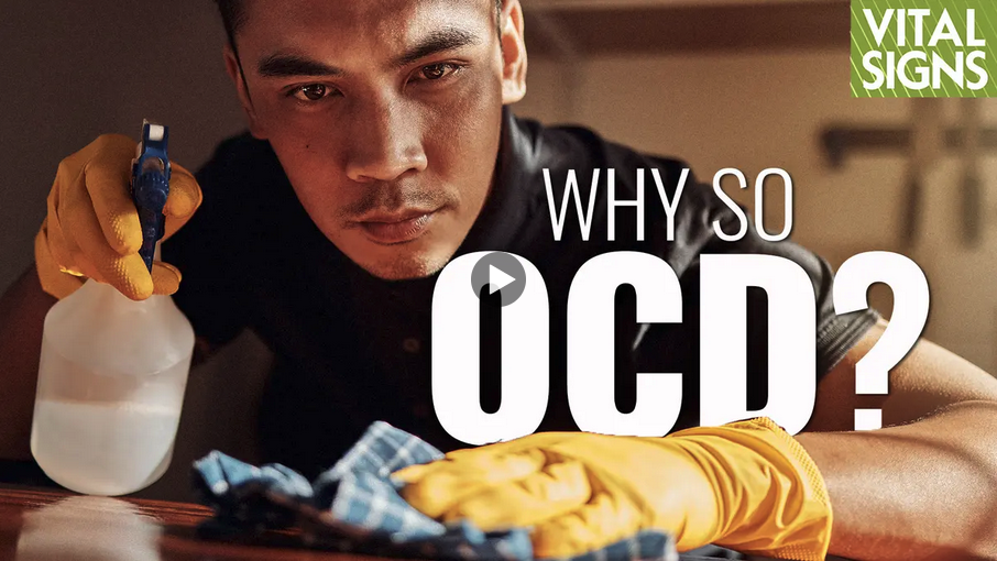 A man wearing yellow rubber gloves is cleaning a surface with a spray bottle and a cloth. The text on the image reads, 'Why so OCD?' and there is a small green label in the top right corner that says 'Vital Signs.'