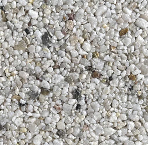 Close-up of small, white, beige, gray, and black gravel stones.