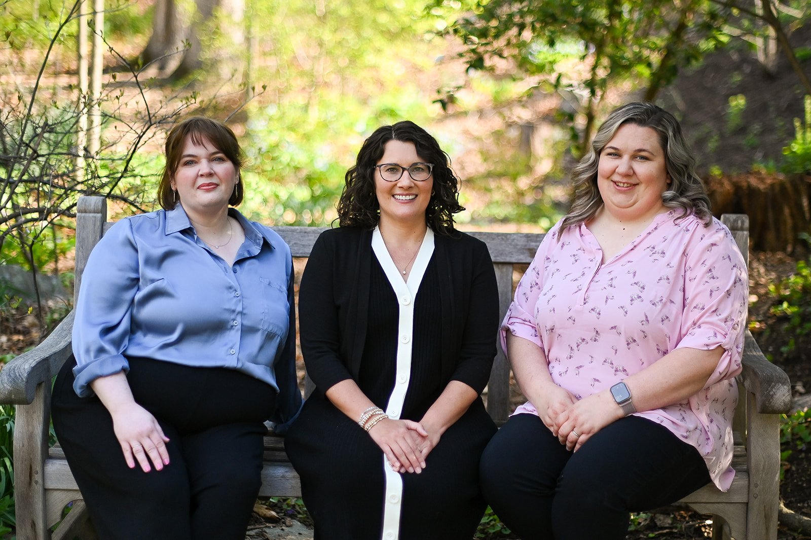 Picture of the Beth Driver Law Team on a bench