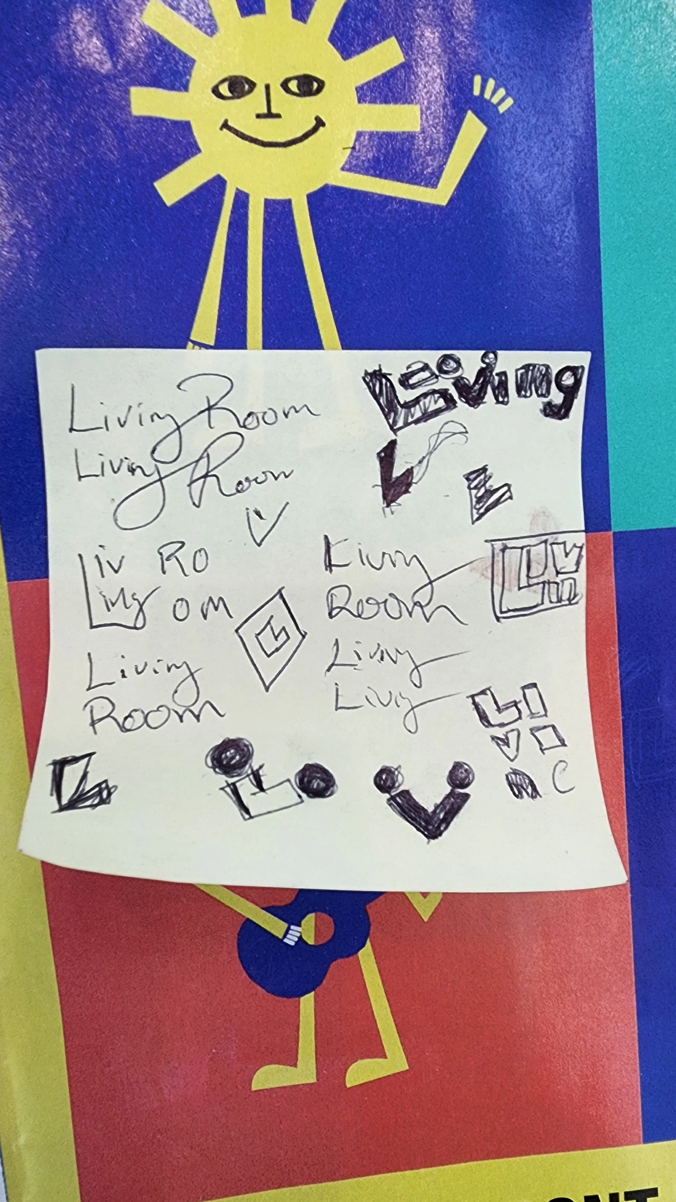 A colorful cartoon drawing of a smiling sun with a human face, waving. There is a hand-written note on white paper attached with various sketches and repeated words 'Living Room' with some geometric shapes and patterns.
