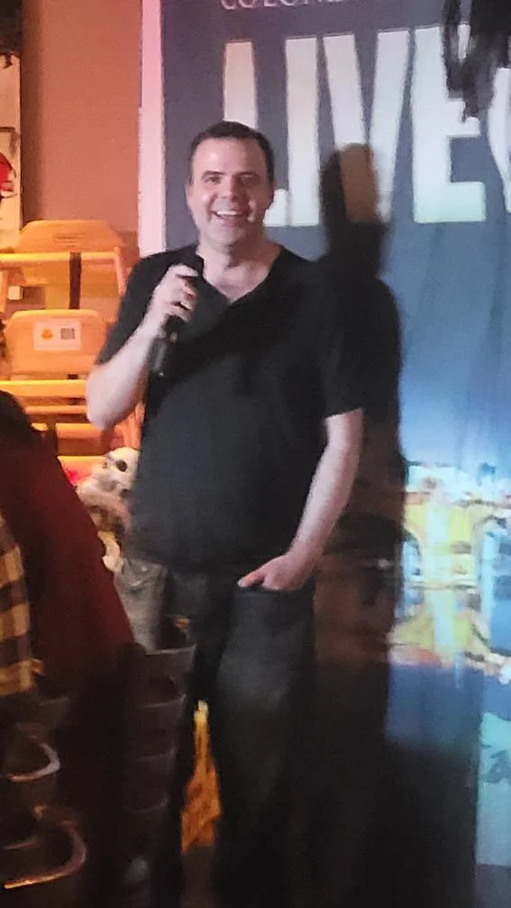 Doing stand-up in Colonial Heights, VA on the Pub and Grub Comedy Tour.
