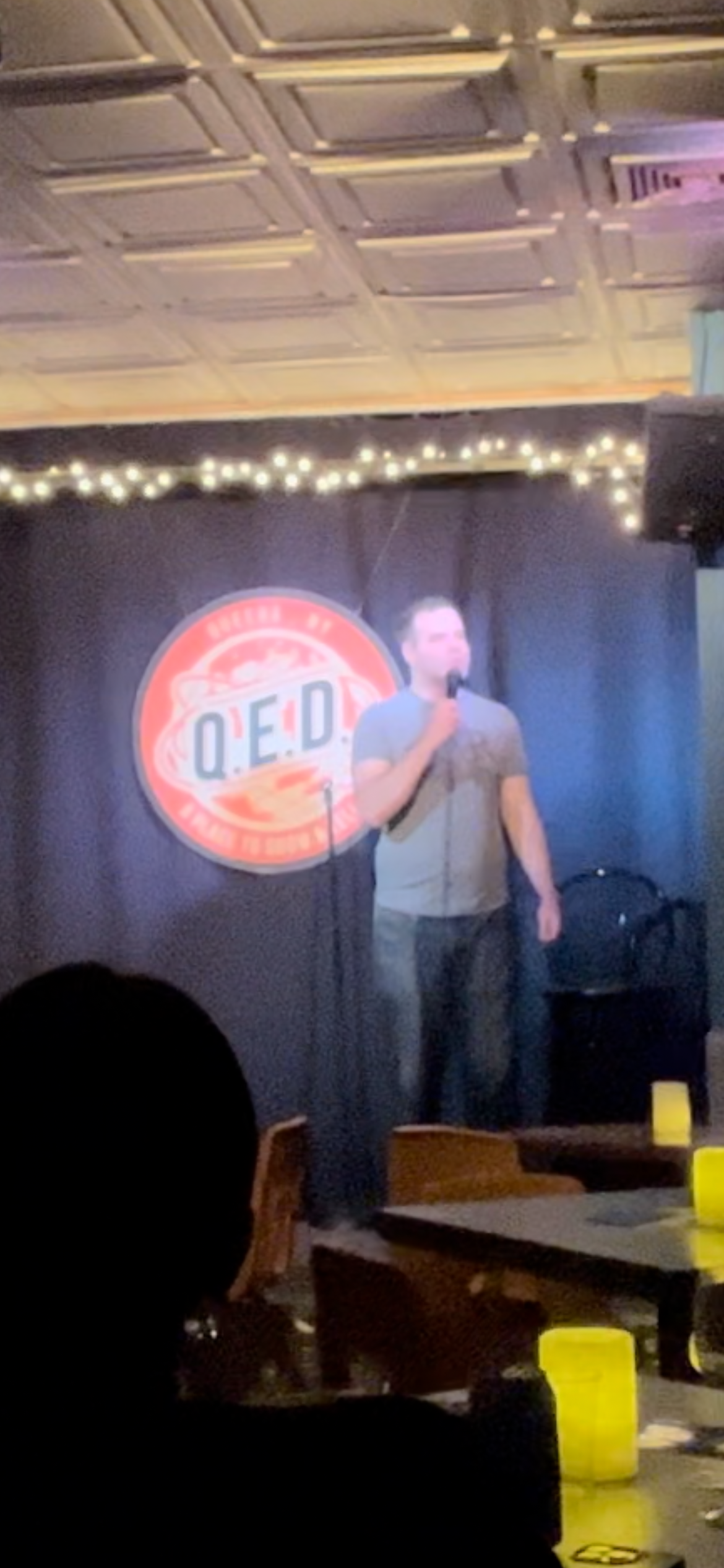 Doing stand-up at QED.