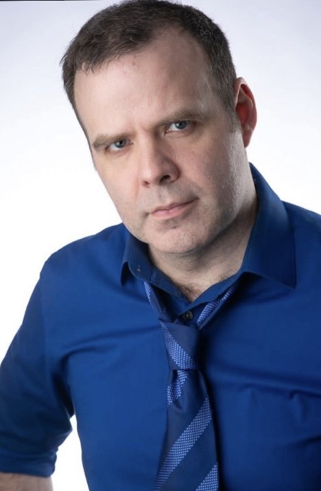 Headshot for playing journalist, detective, or lawyer.