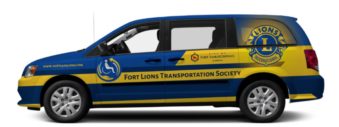 Blue and yellow vehicle with logos and text for Fort Lions Transportation Society, belonging to Fort Saskatchewan, Alberta, with a Lions International emblem and accessibility symbol on the side.