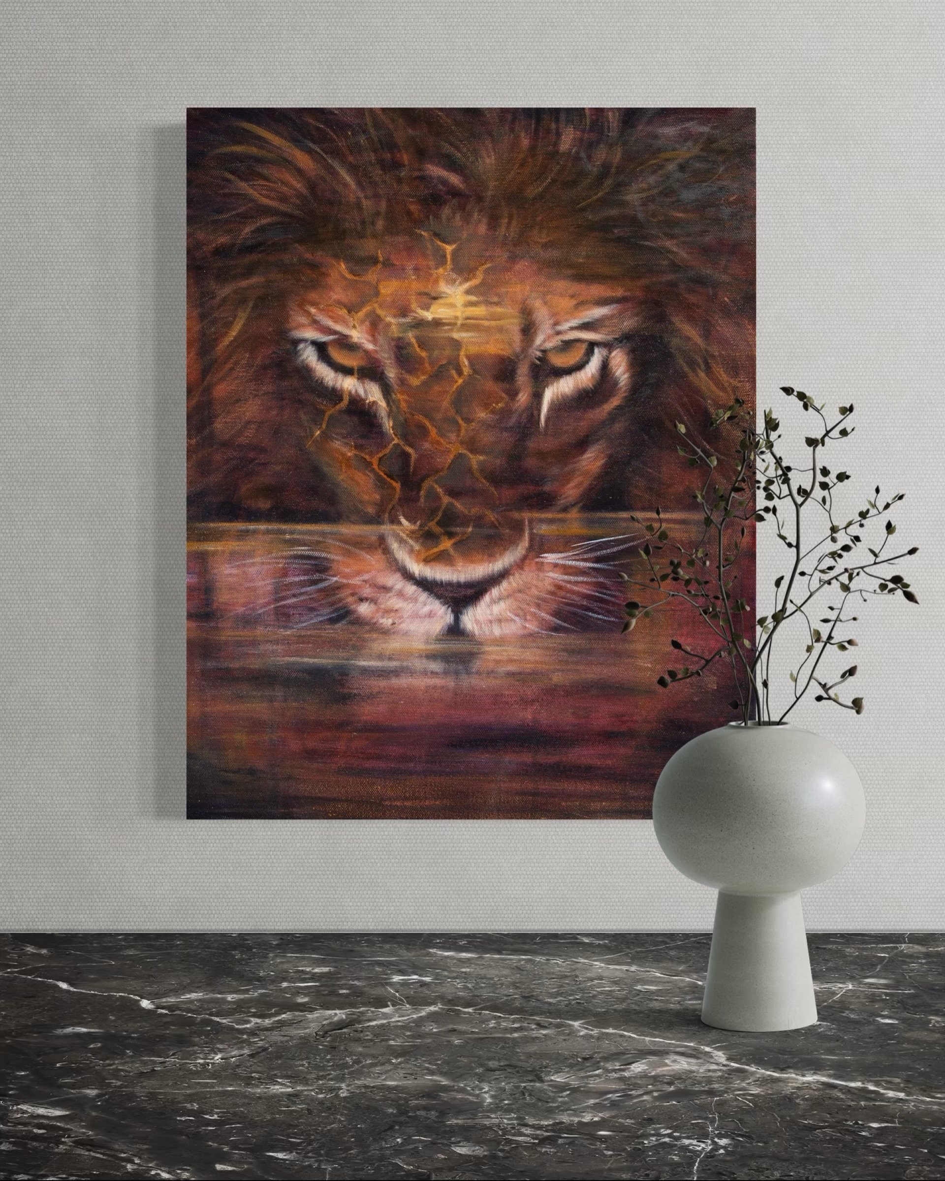 A painting of a lion's face with a dark background, featuring glowing eyes and cracks resembling lightning on its forehead, hung on a textured gray wall. In front of the painting is a white, modern, rounded table with a small branch of green leaves in a white vase placed on top.