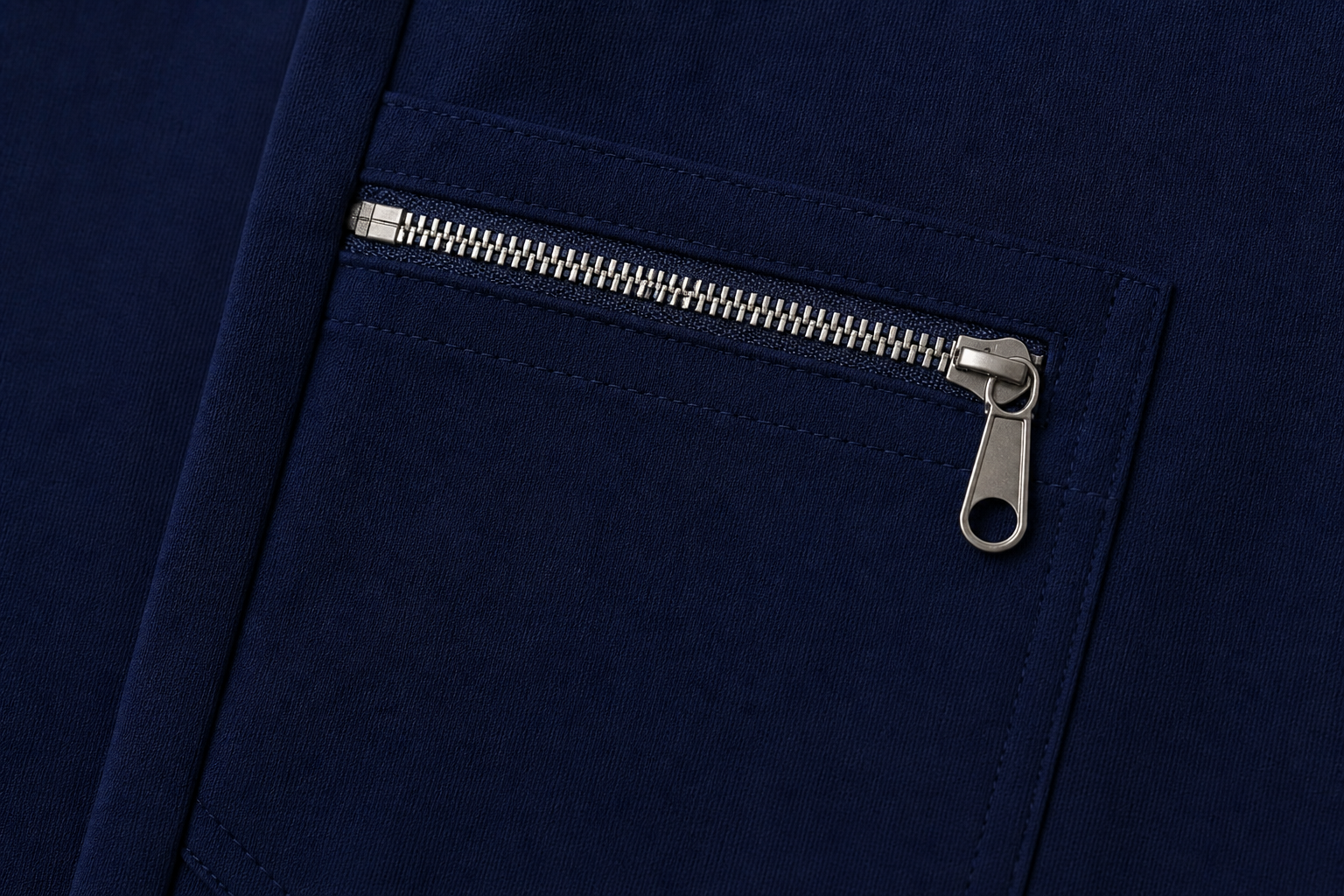 navy zipper close up.png
