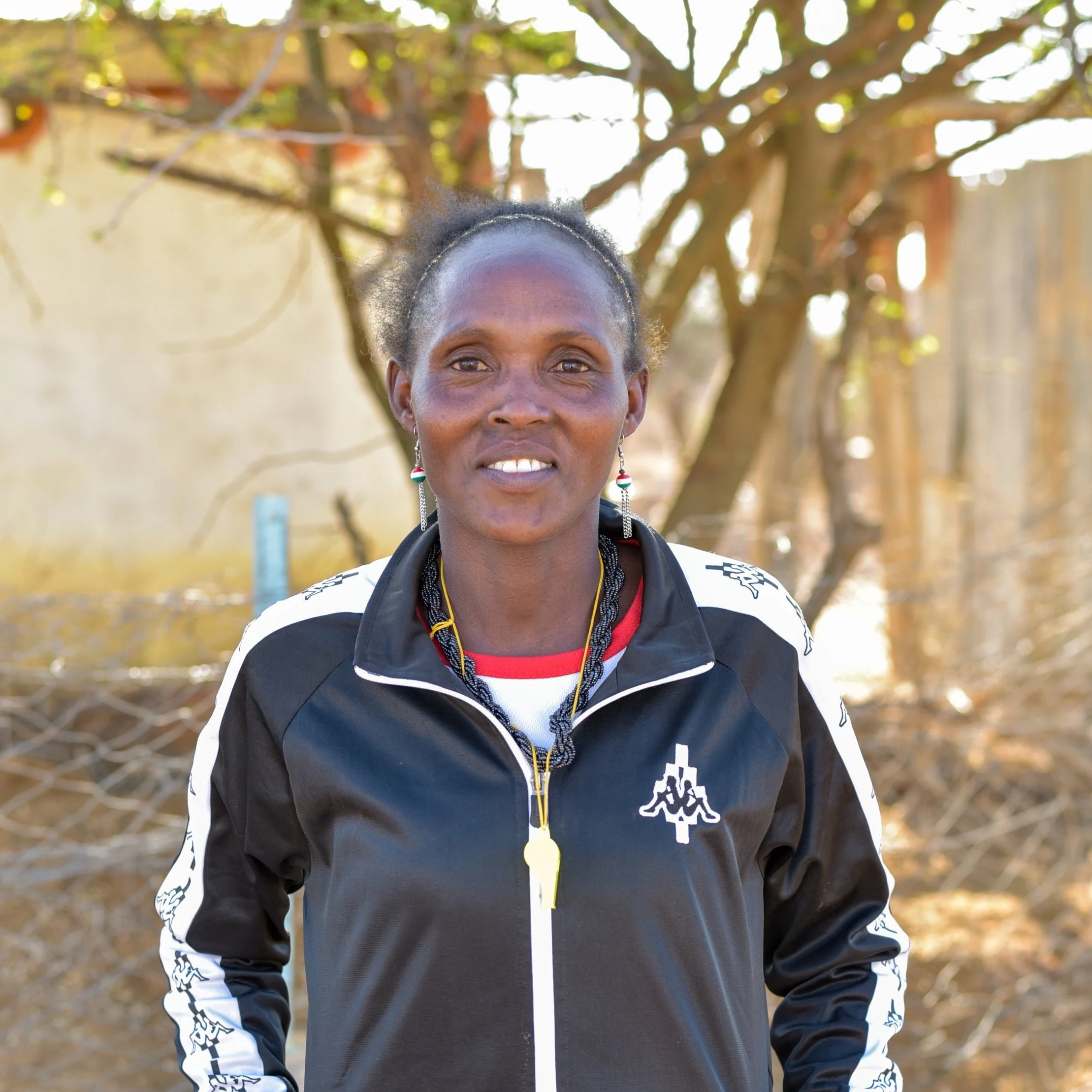 Coach Beatrice

Beatrice is a mother of three and a strong distance runner. She has been a champion in various races,  among them The Amazing Maasai Marathon.

She comes from a humble family of 16 kids.
As a coach she is very active and like to run l