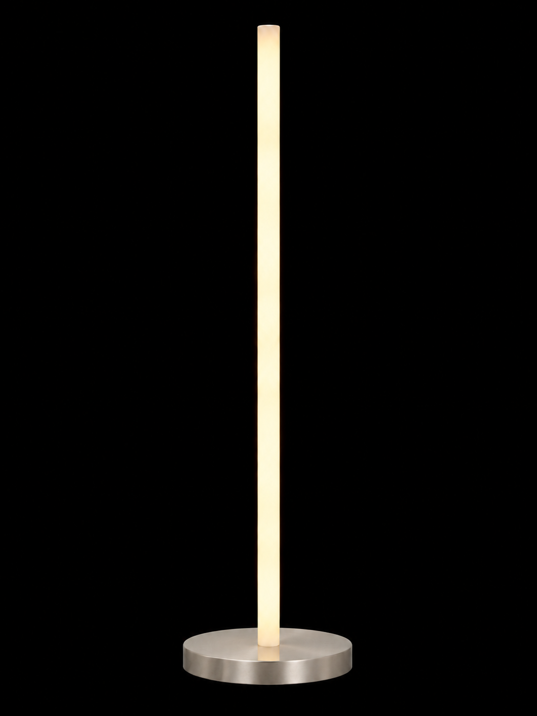 Eldon Trace Column lamp in nickel, a warm white lit column on a round polished nickel disc base.