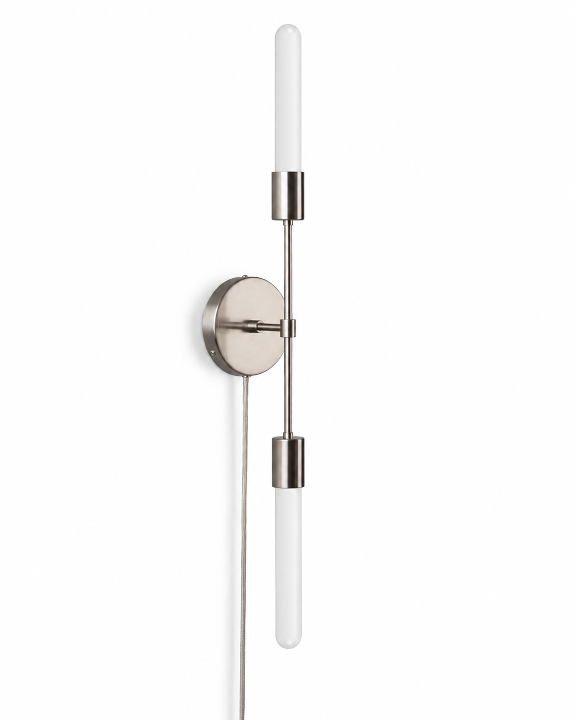 ChatGPT Eldon Trace Plus One double sconce in nickel, two bare bulbs on a slim arm with a round wall canopy and plug-in cord.Jun 21, 2026, 08_08_07 PM.png