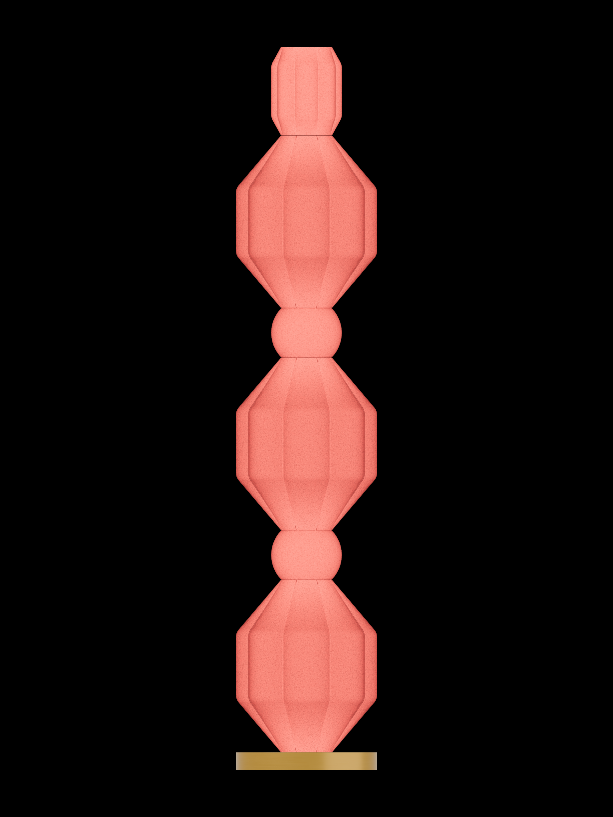 Elaine Totem lamp with pink stacked shapes on a brass base, illuminated