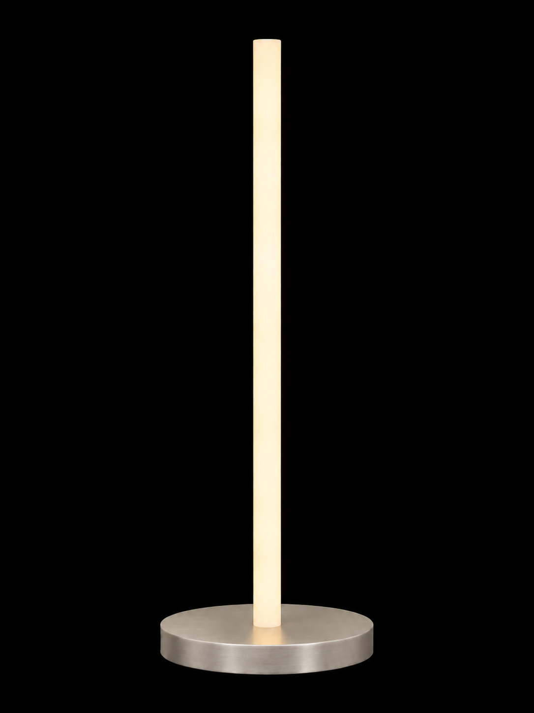Eldon Trace Column lamp in nickel, a warm white lit column on a round polished nickel disc base.