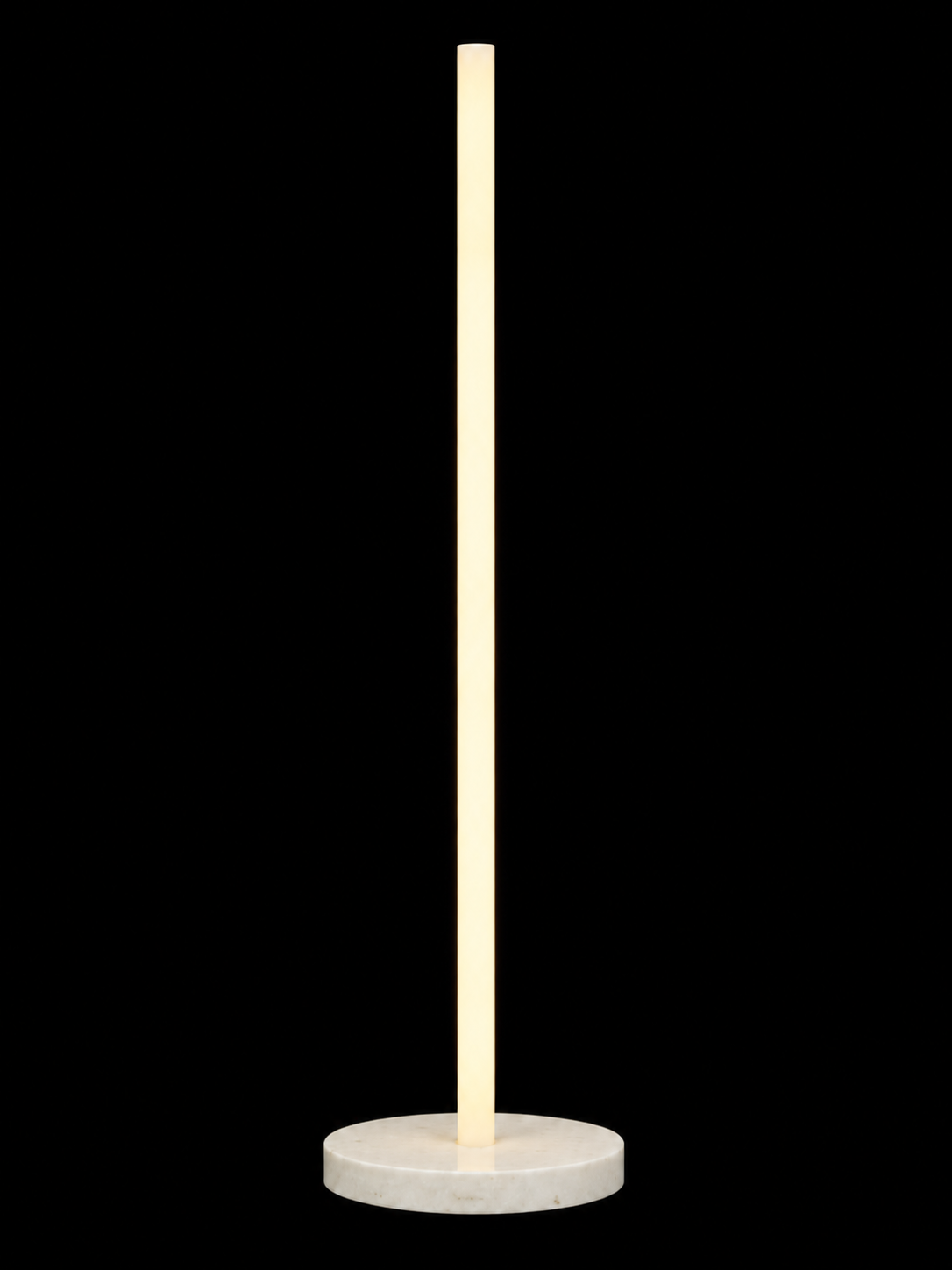Eldon Trace Column lamp in black marble, a warm white lit column on a round black marble disc base.