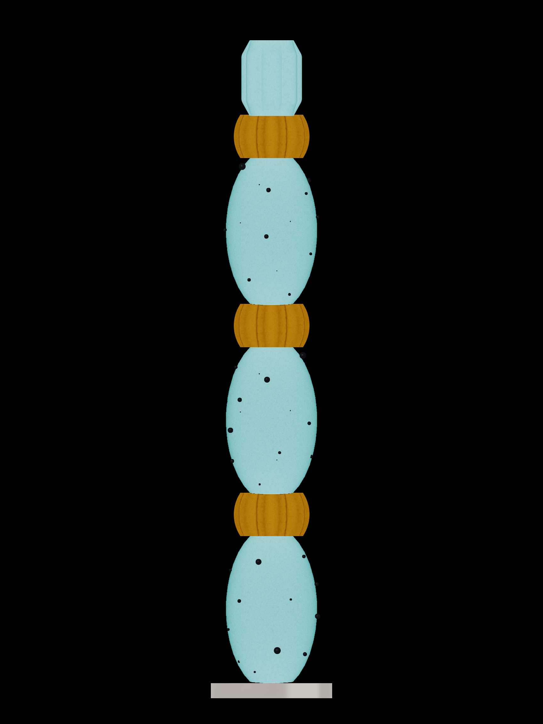 MIKA Totem lamp, light on: illuminated pale blue forms and warm golden rings above a nickel disc base against black.