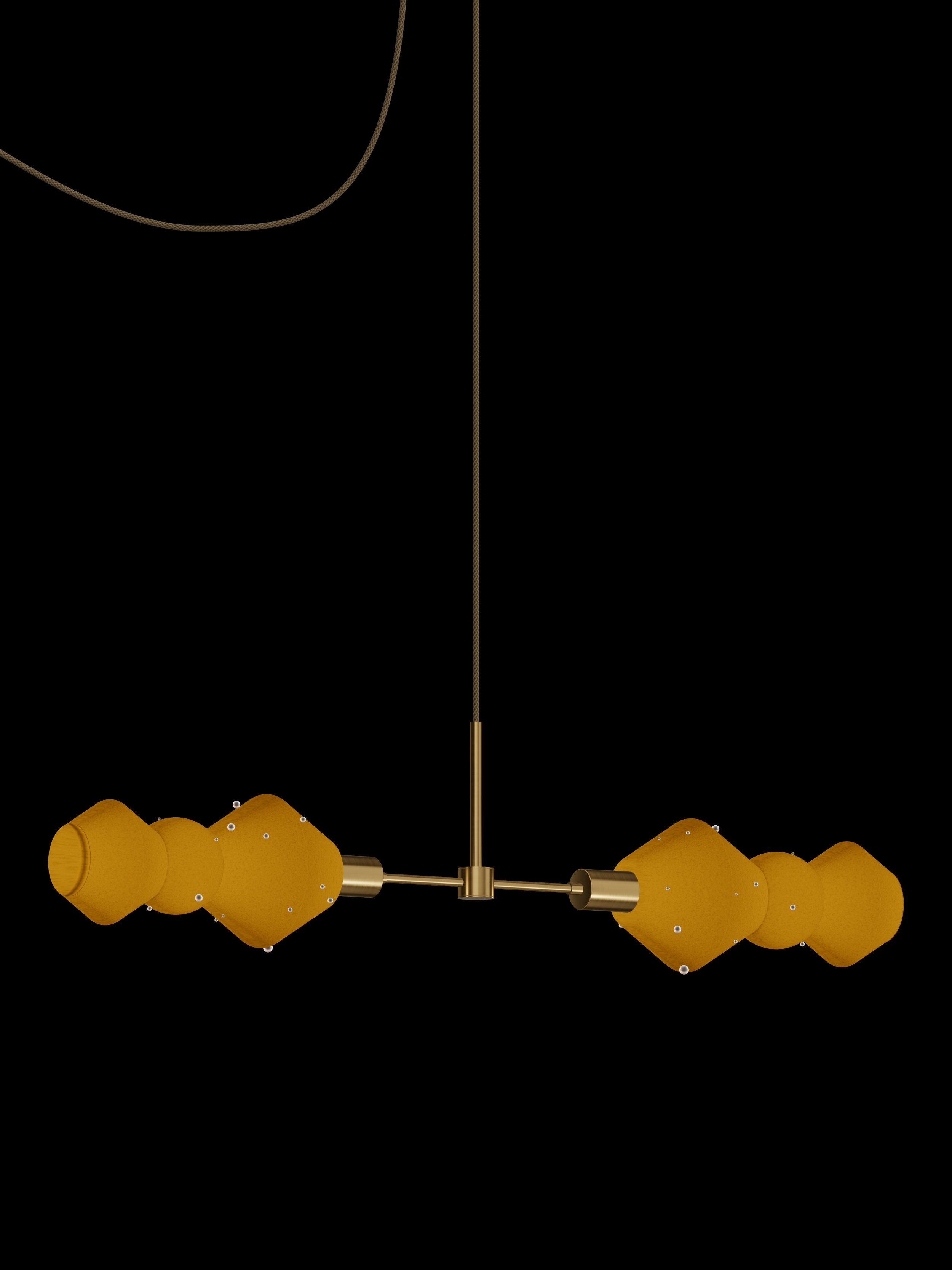 Viv Eavesdropper horizontal pendant with shapes glowing amber with pearl details and brass hardware; plug-in version.