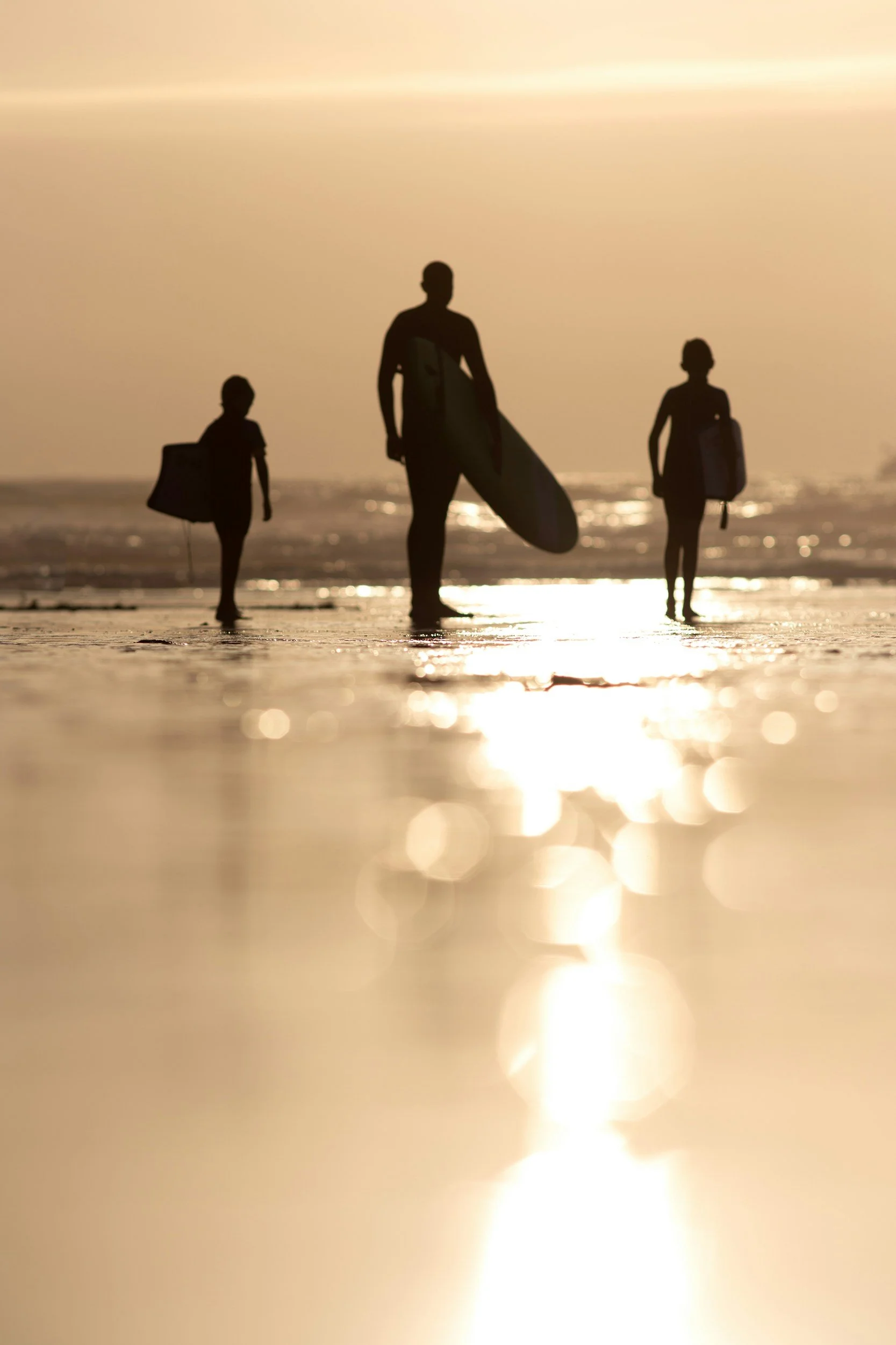 surf lesson with three people looking calm and fun