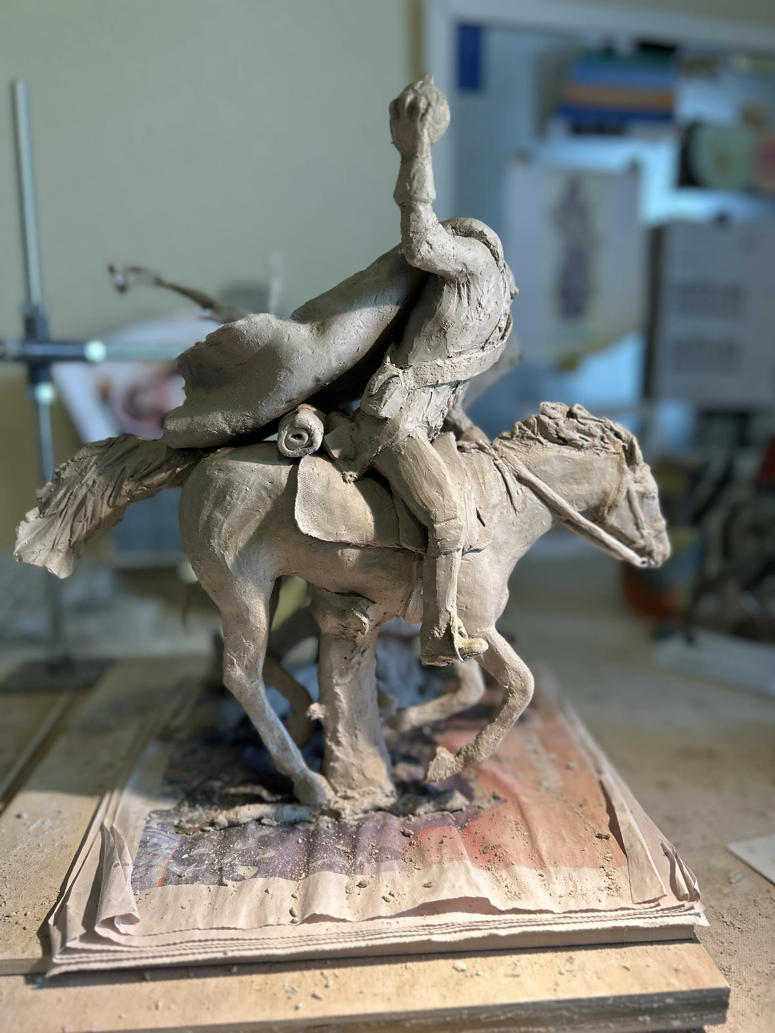 Mounted the horse and rider to tree base.