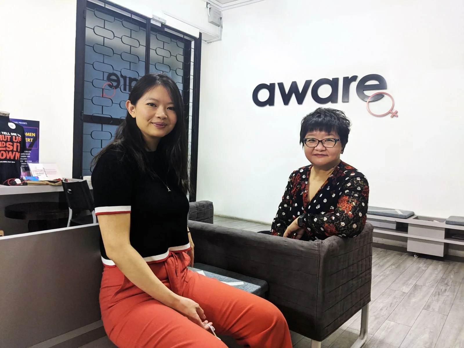 Faction authors Kelly Leow and Jasmine Ng pictured here in the AWARE office in Singapore.