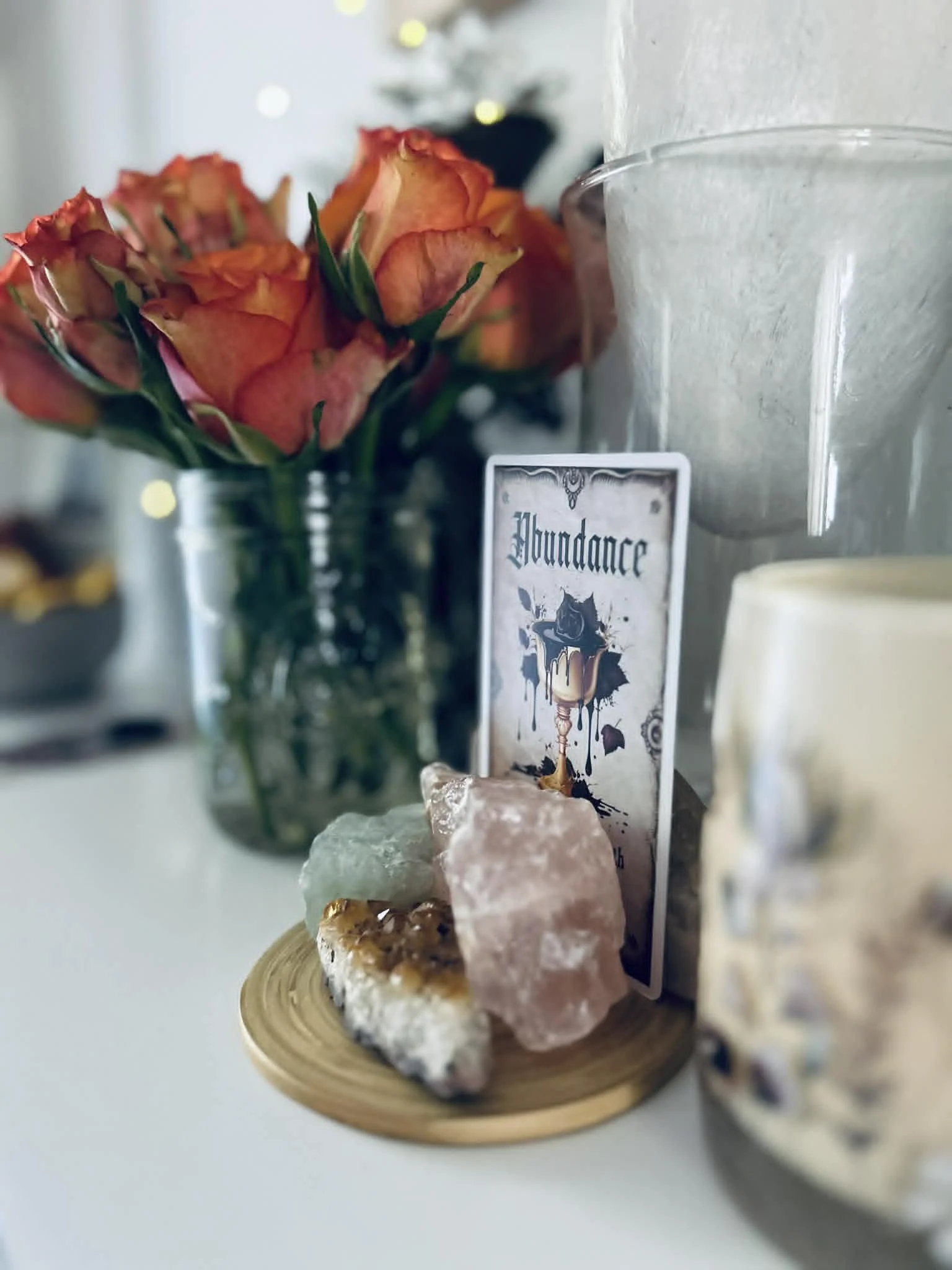 Tarot and abundance card and crystals at Cinder & Sage Tarot