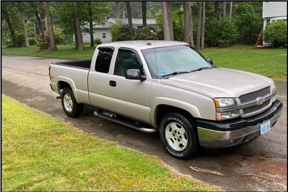 Van Gorden Property Services pickup truck at a North Kingstown, RI job site
