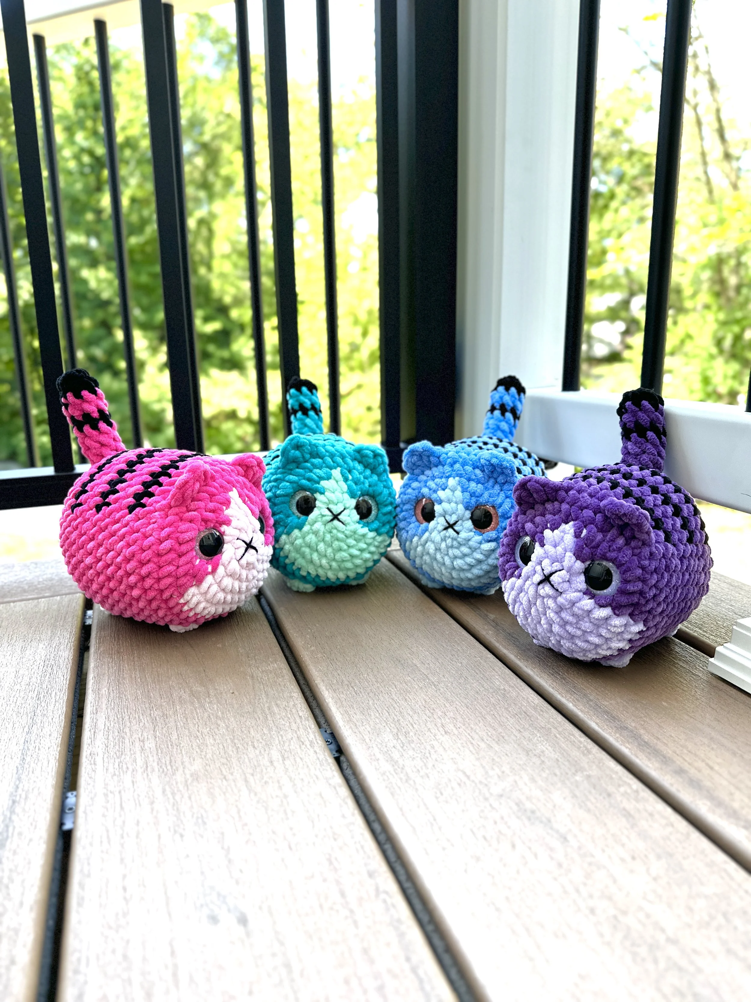 crochet loaf cats in vibrant colors