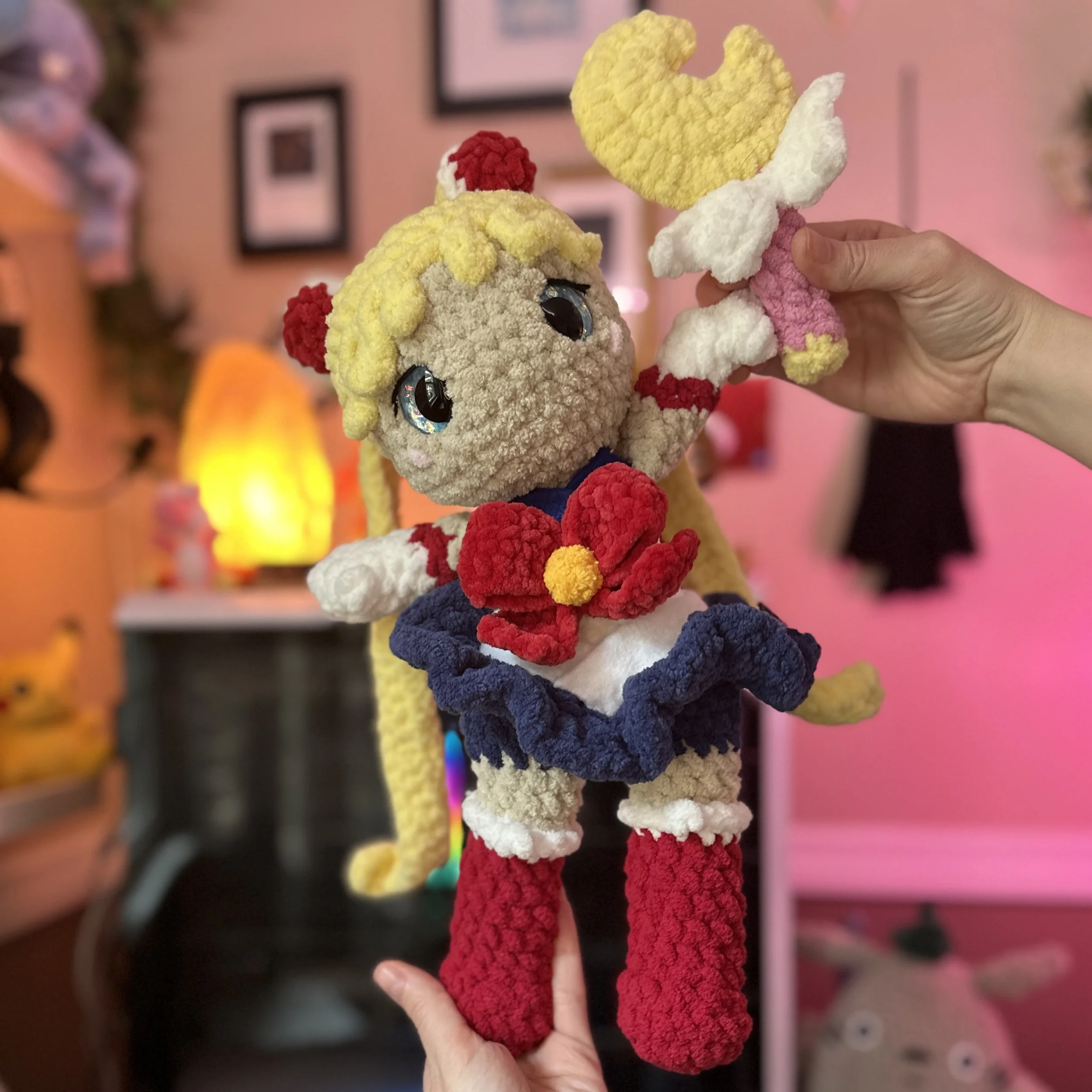 crochet magical girl holding a moon wand