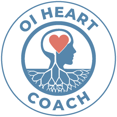 Logo for 'OI Heart Coach' featuring a woman's silhouette with a heart inside her head and leafy roots below, all within a circular design.