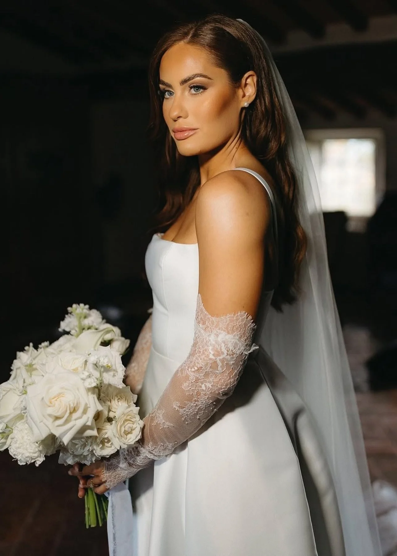 Elegant bridal makeup by Dayna Cerys featuring soft, radiant skin and refined glamour.