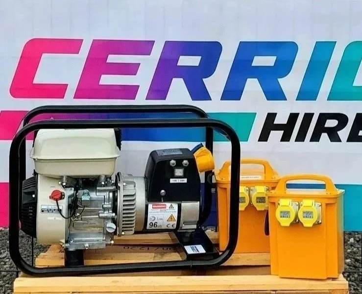 A portable generator with a black frame, beige engine, and black control panel, placed on a wooden pallet. Behind it, there are two yellow extension cords with outlets, packaged in yellow cases, and a backdrop with colorful text