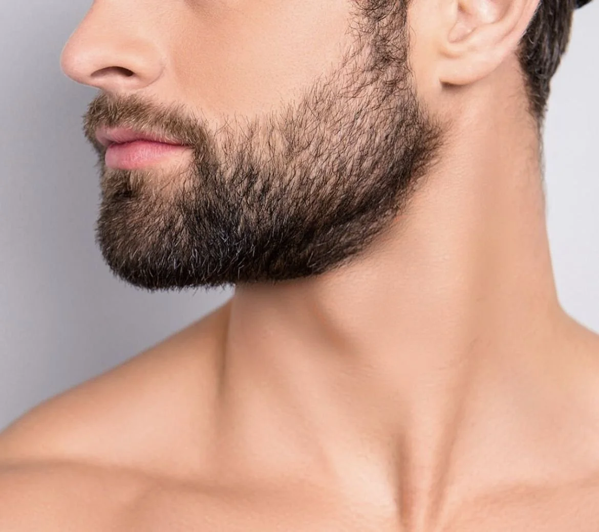 Close-up of a man with a full, well-groomed beard on review tab