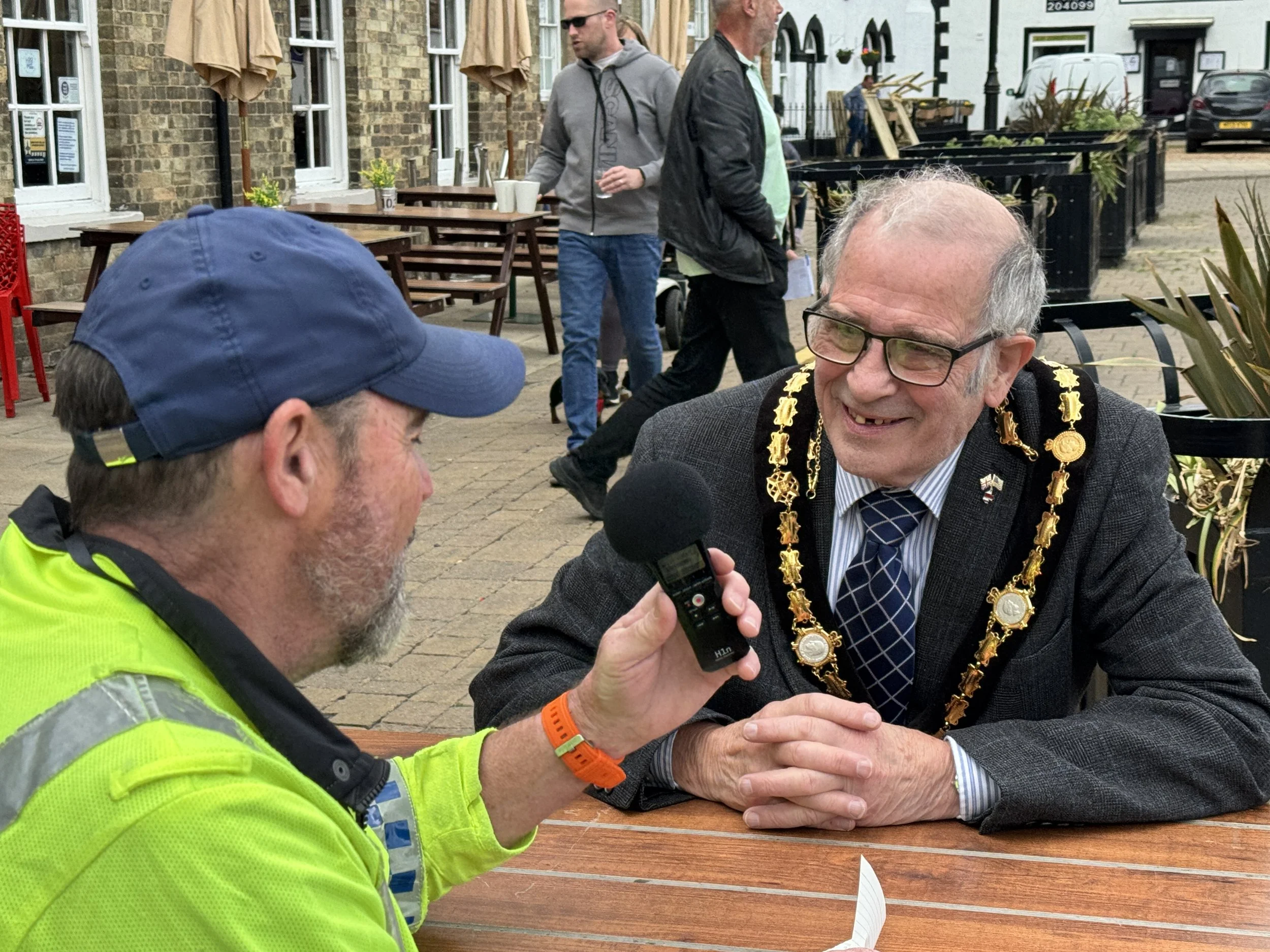 Whittlesey Mayor being interviewed at The Fenland Bus Parade organised by Moremuzic Radio.