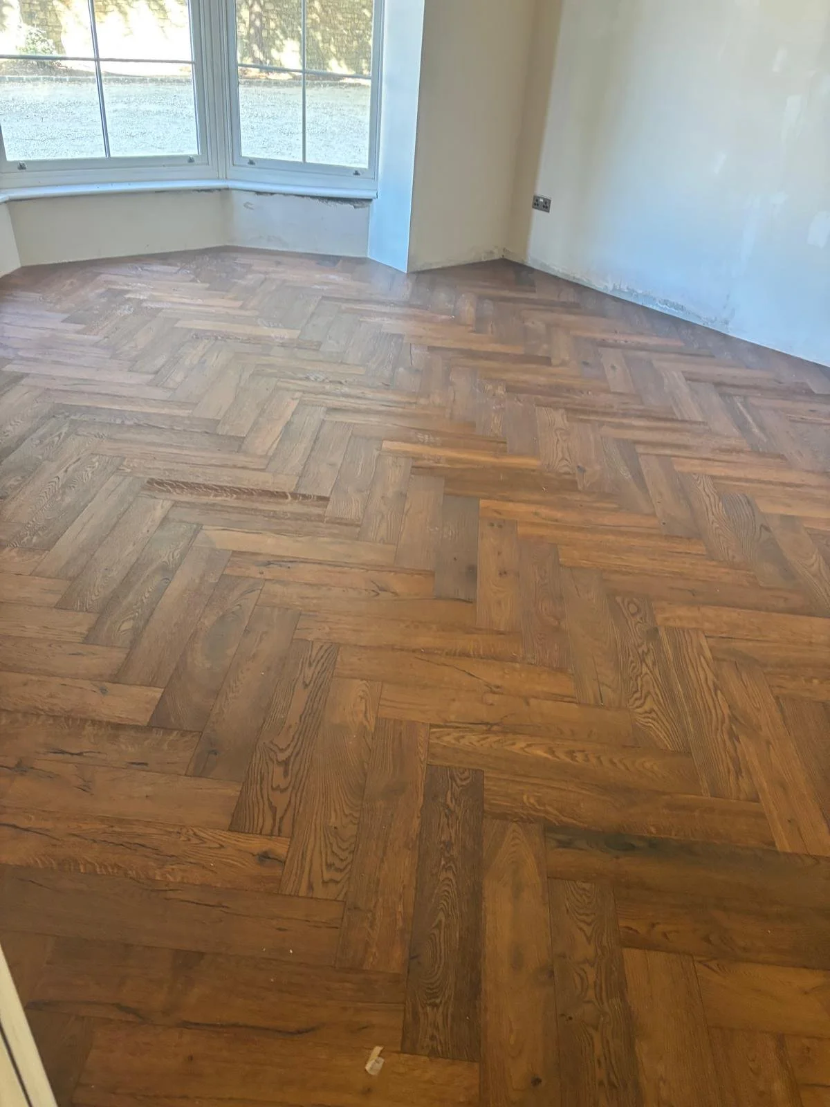 a rich brown red wood floor