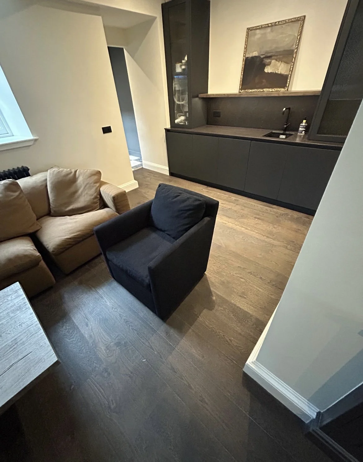 a dark brown wood plank floor