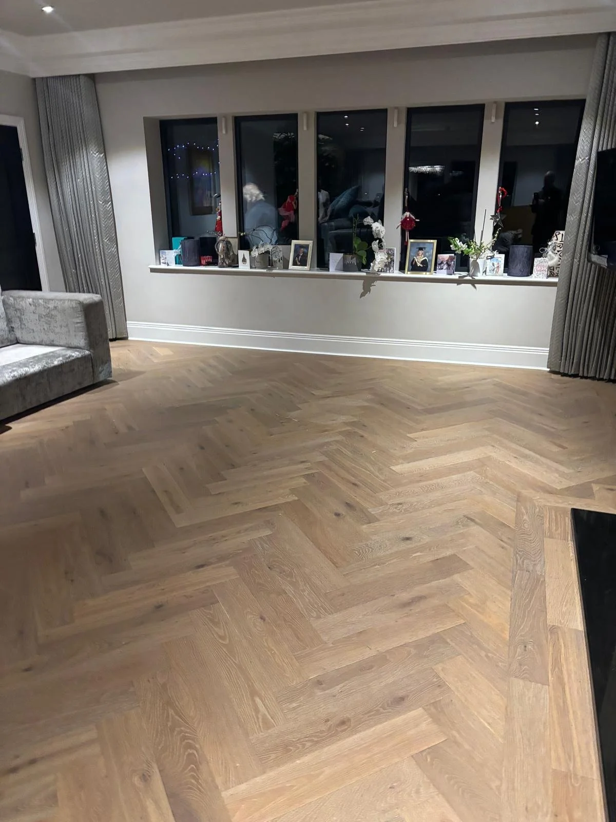 a rustic herringbone wood floor