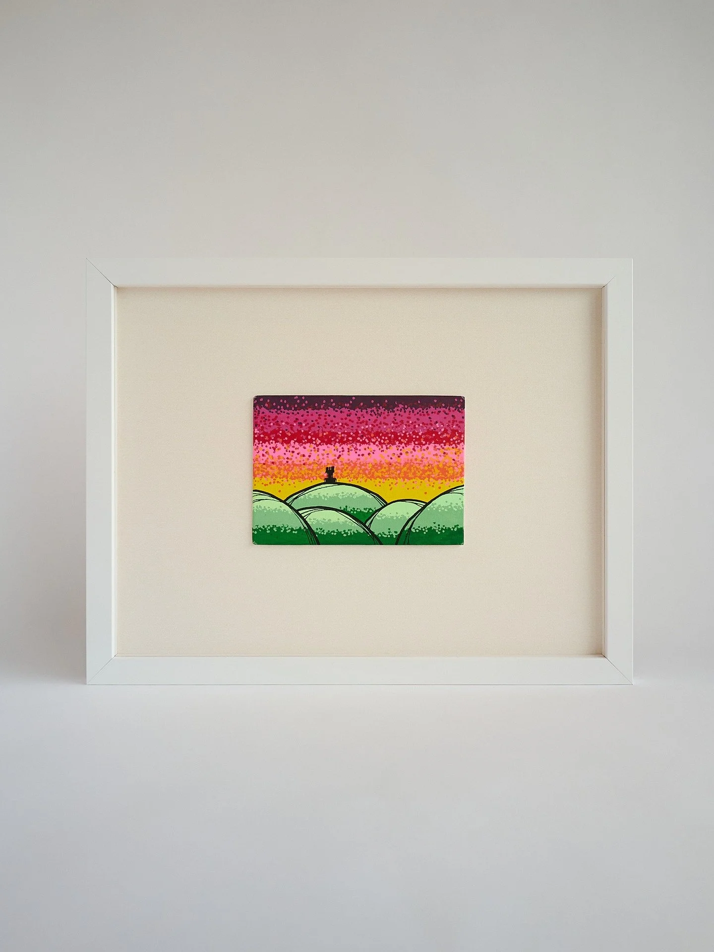 A small brightly coloured canvas of Peel Tower on Holcombe Hill (West Pennine Moors). 

Floating on an off-white backing, in a deep white frame. 

🖼 🖼 🖼