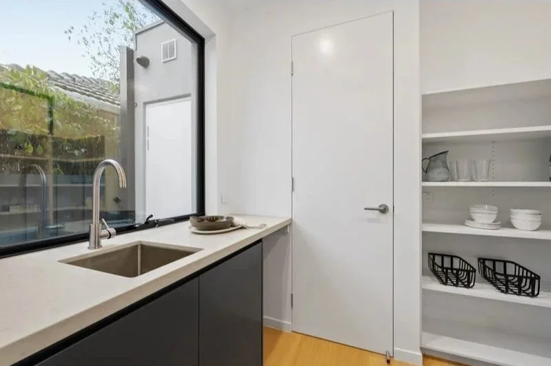 Butler’s pantry with sink and open shelving, Bentleigh townhouse