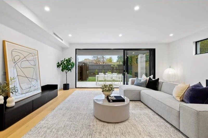 Living room opening to the alfresco, Bentleigh townhouse