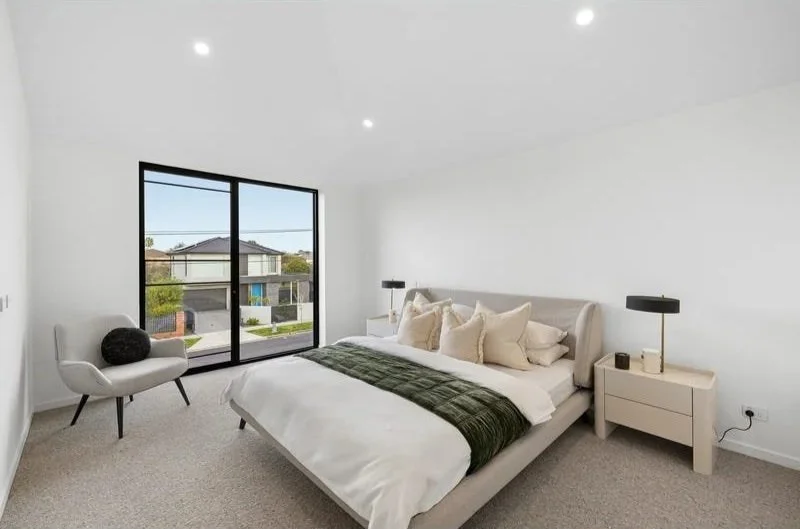 Master suite with sliding door to the balcony, Bentleigh townhouse