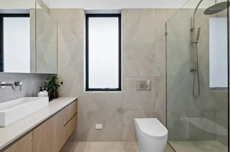 Powder room with frosted window, Bentleigh townhouse
