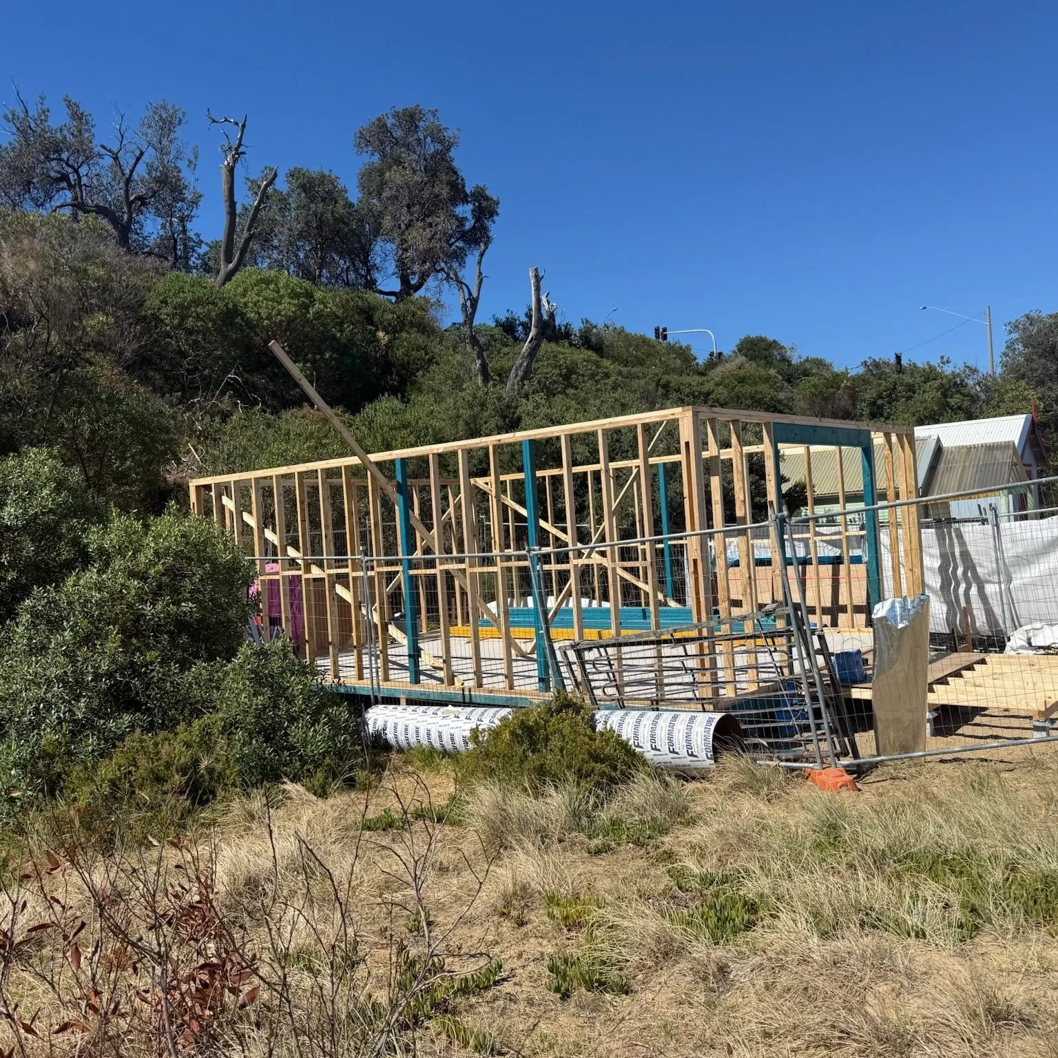 Timber frame going up, beach boatshed rebuild