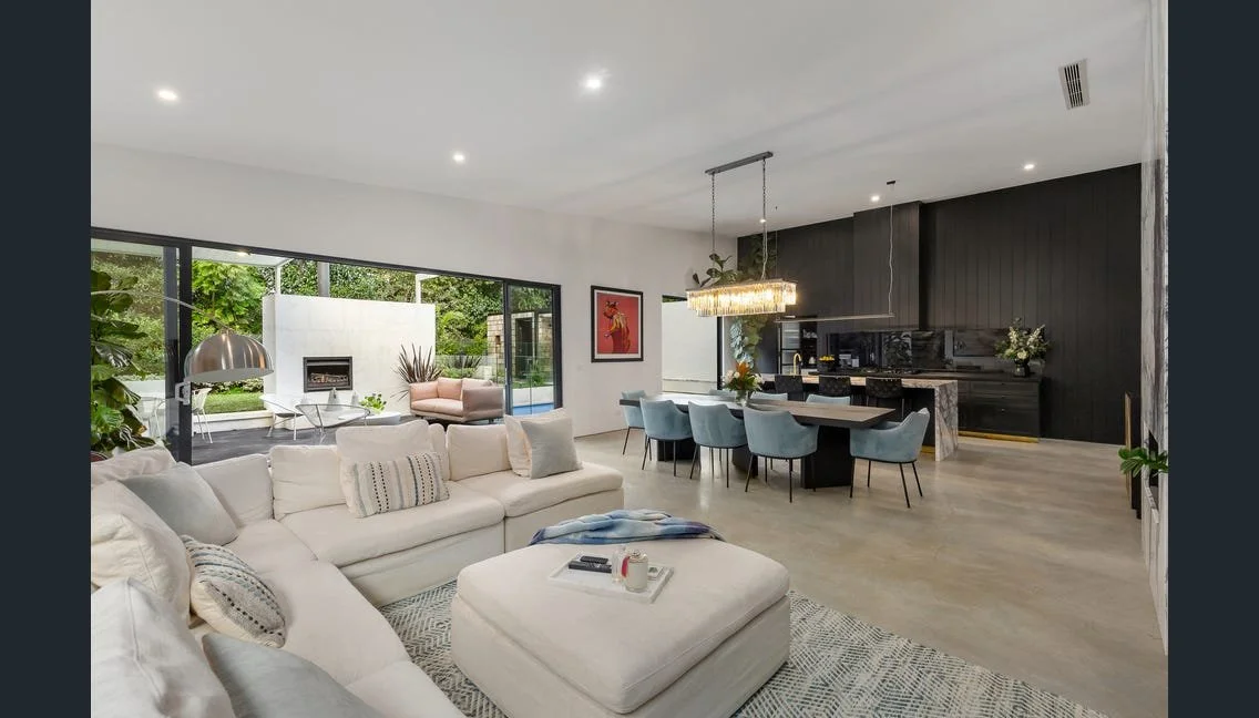 Open-plan living, dining and kitchen opening to the alfresco, Highett renovation